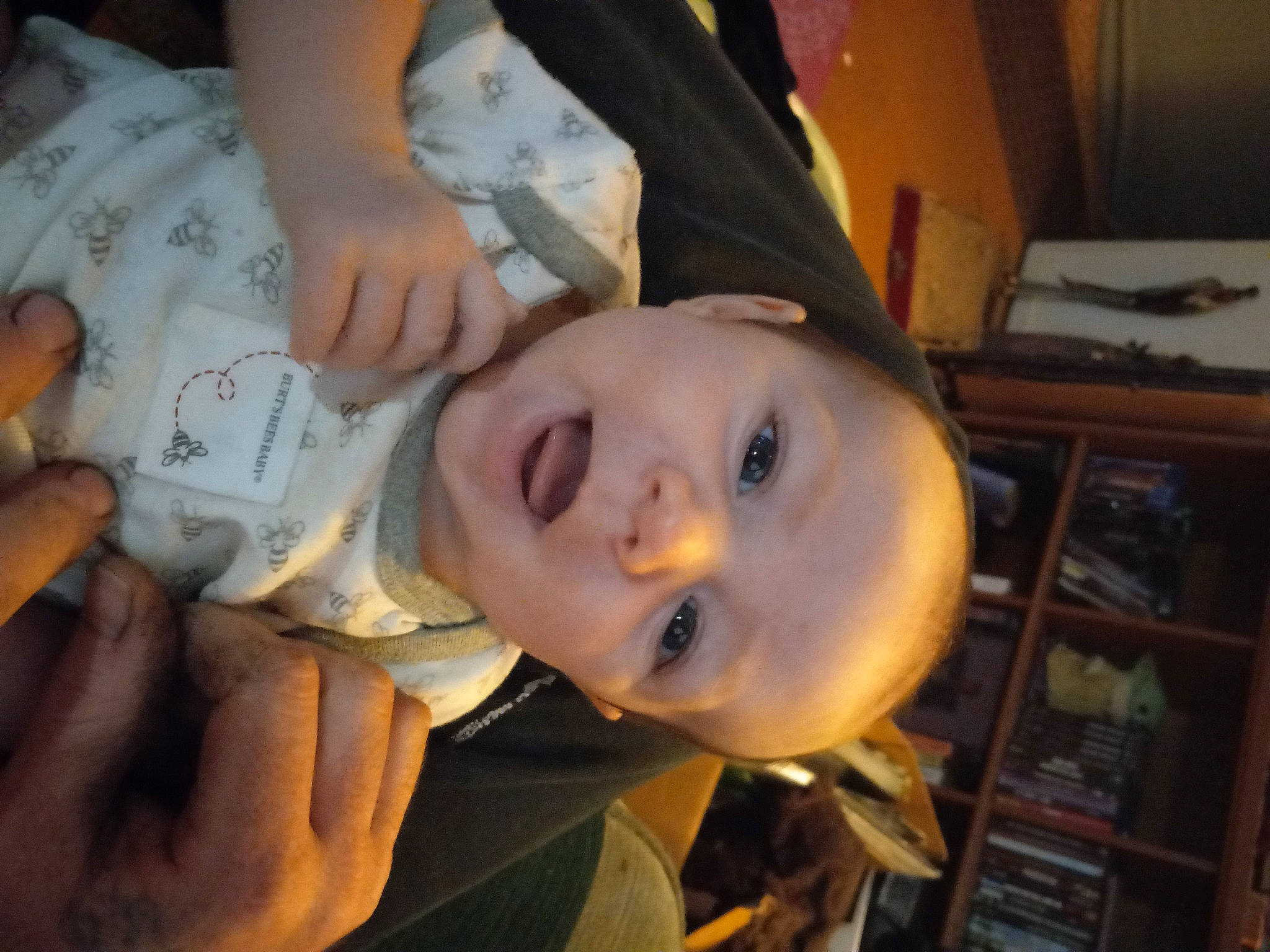 Valor is registered to the contest to win money with this photo: cheek, child, ear, eyelash, finger, gesture, hand, happy, hat, helmet, human_body, jaw, lip, mouth, nail, nose, person, shelf, skin, thumb