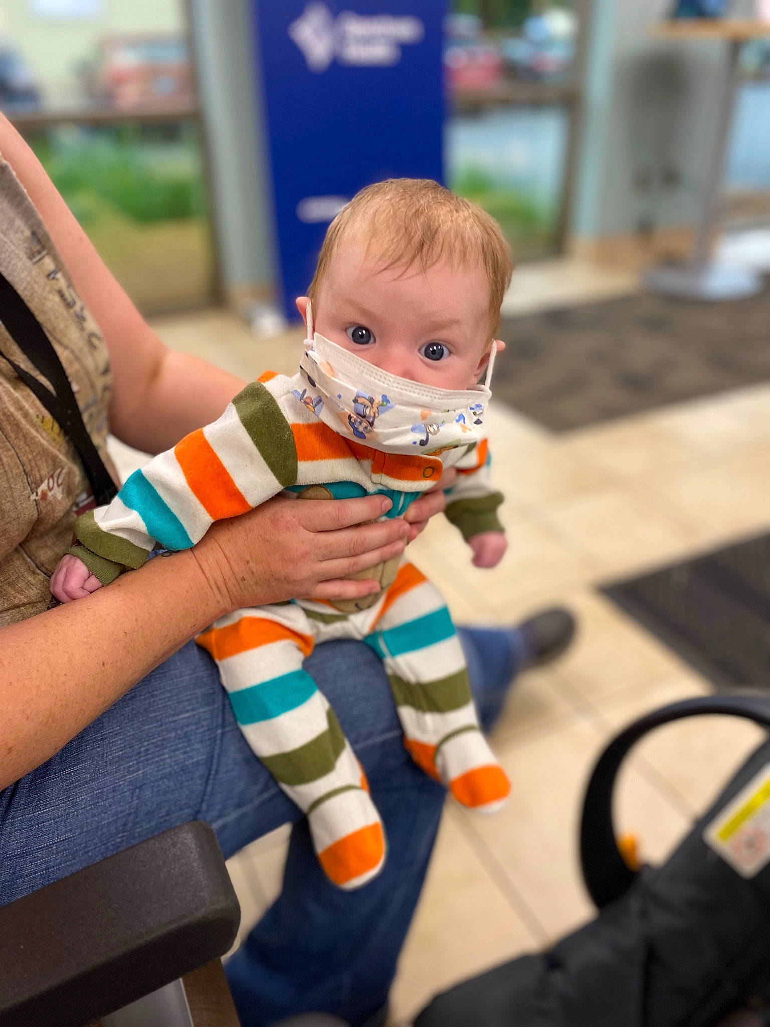 Nevaeh Kidd is registered to the contest to win money with this photo: baby, baby_products, baby_toddler_clothing, child, costume, event, fictional_character, flooring, fun, leisure, orange, pattern, person, personal_protective_equipment, play, room, sitting, sock, stuffed_toy, toddler