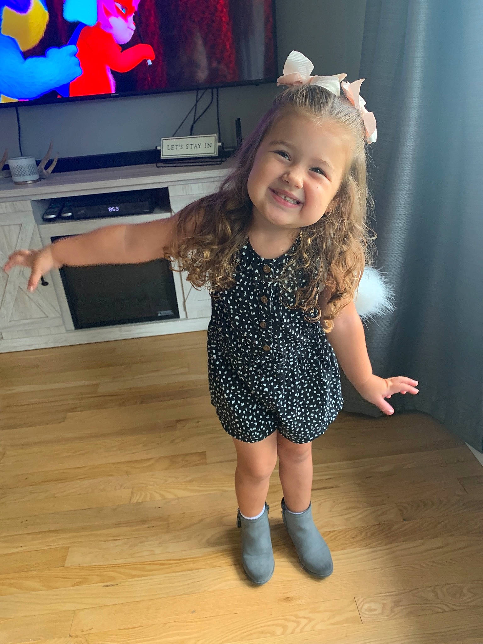 Kinleigh is registered to the contest to win money with this photo: child, child_model, dress, eye, floor, flooring, footwear, fun, happy, joint, joy, leg, leggings, pattern, person, play, shoe, skin, sleeve, smile