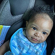 Atreus joined the competition — help win amazing prizes! baby, blue_bib, car_seat, child, child_safety, close_up, clothing, curly_hair, cute, earring, happy, indoor, infant, infant_clothing, portrait, safety_belt, seatbelt, smile, toddler, young_child