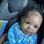 baby, blue_bib, car_seat, child, child_safety, close_up, clothing, curly_hair, cute, earring, happy, indoor, infant, infant_clothing, portrait, safety_belt, seatbelt, smile, toddler, young_child