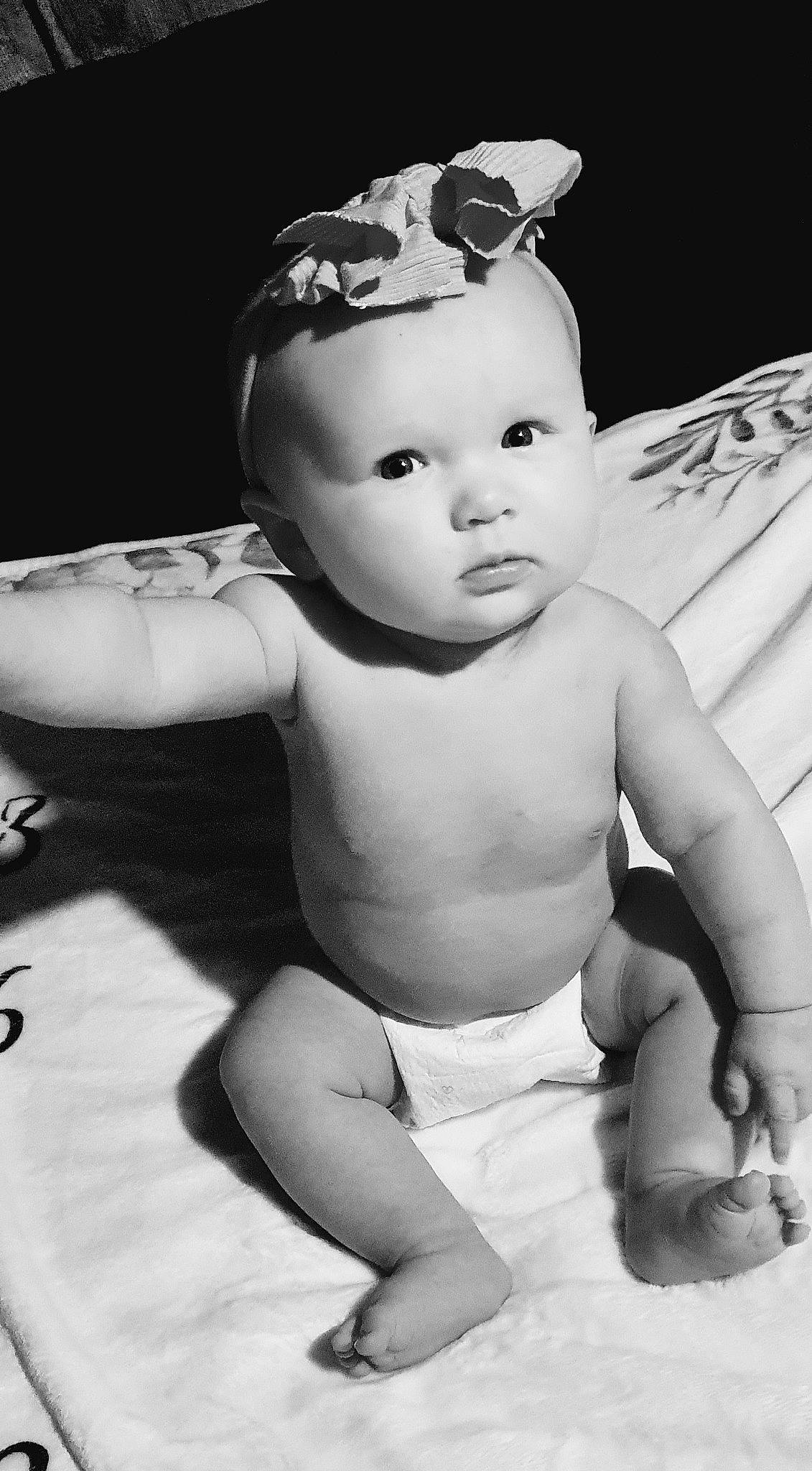 Novalee is registered to the contest to win money with this photo: baby, black, cheek, eyebrow, eyelash, finger, flash_photography, gesture, hand, happy, human_body, iris, leg, lip, organ, person, skin, stomach, style, toddler