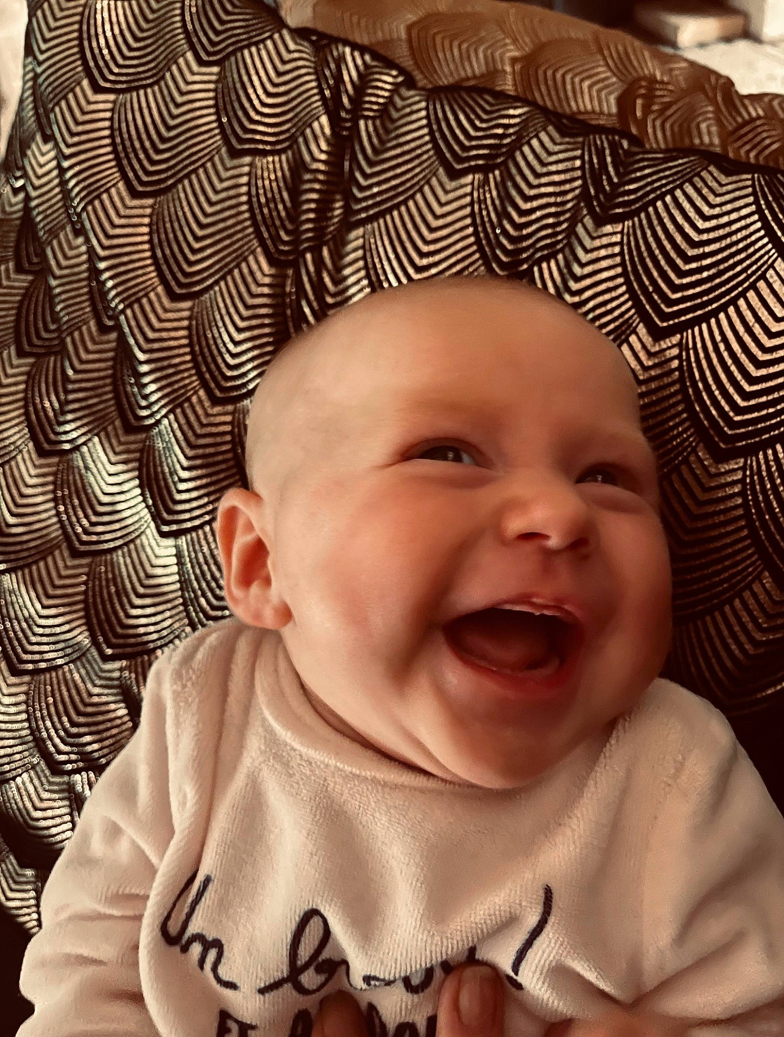 Lily participe au concours pour gagner de l'argent avec cette photo : baby, baby_toddler_clothing, cheek, chin, comfort, eye, face, facial_expression, happy, head, lip, mouth, nose, organ, person, photograph, product, skin, sleeve, smile