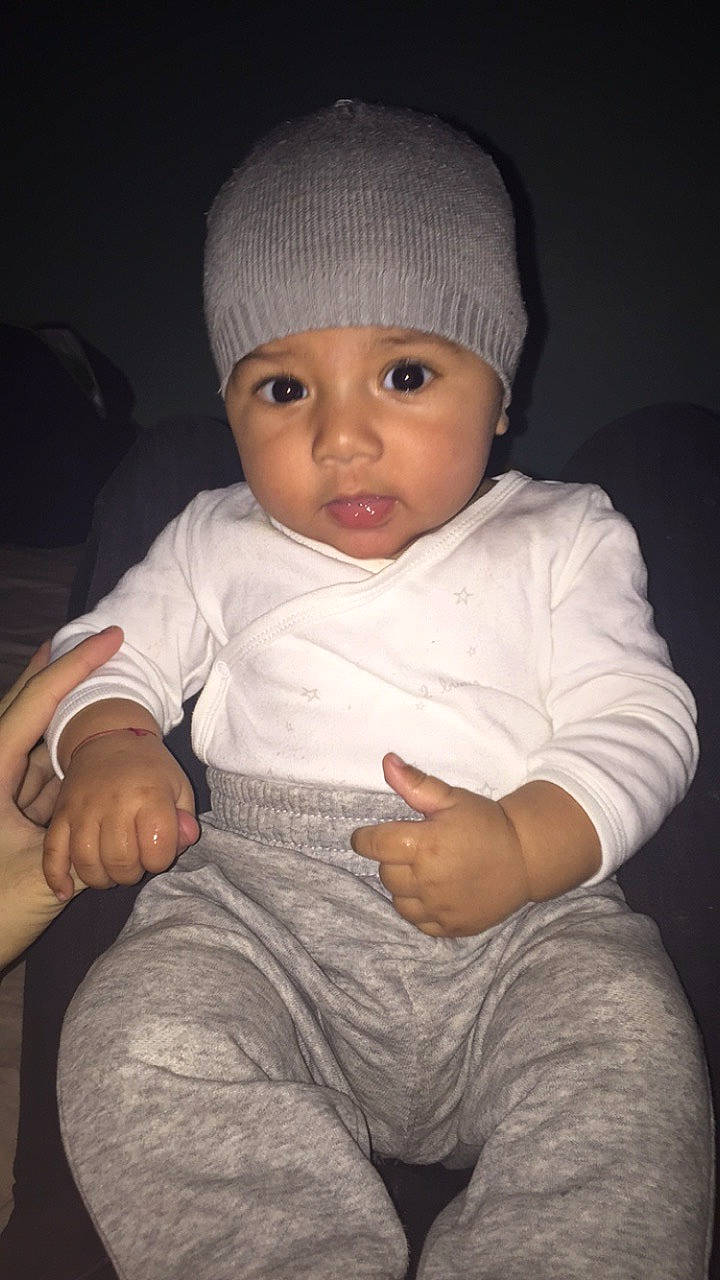 Evan a rejoint le concours — aidez-le/la à gagner de superbes lots ! baby, baby_toddler_clothing, cap, cheek, chin, cool, eye, eyebrow, face, flash_photography, head, headwear, human_body, lip, nose, organ, outerwear, person, photograph, skin