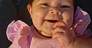 Paisley'Rae joined the competition — help win amazing prizes! baby, smiling, infant, pink_clothing, hand, face, person, adult, indoor, candid, happy, cheeks, closeup, portrait, cute, child, young, holding, sitting, family