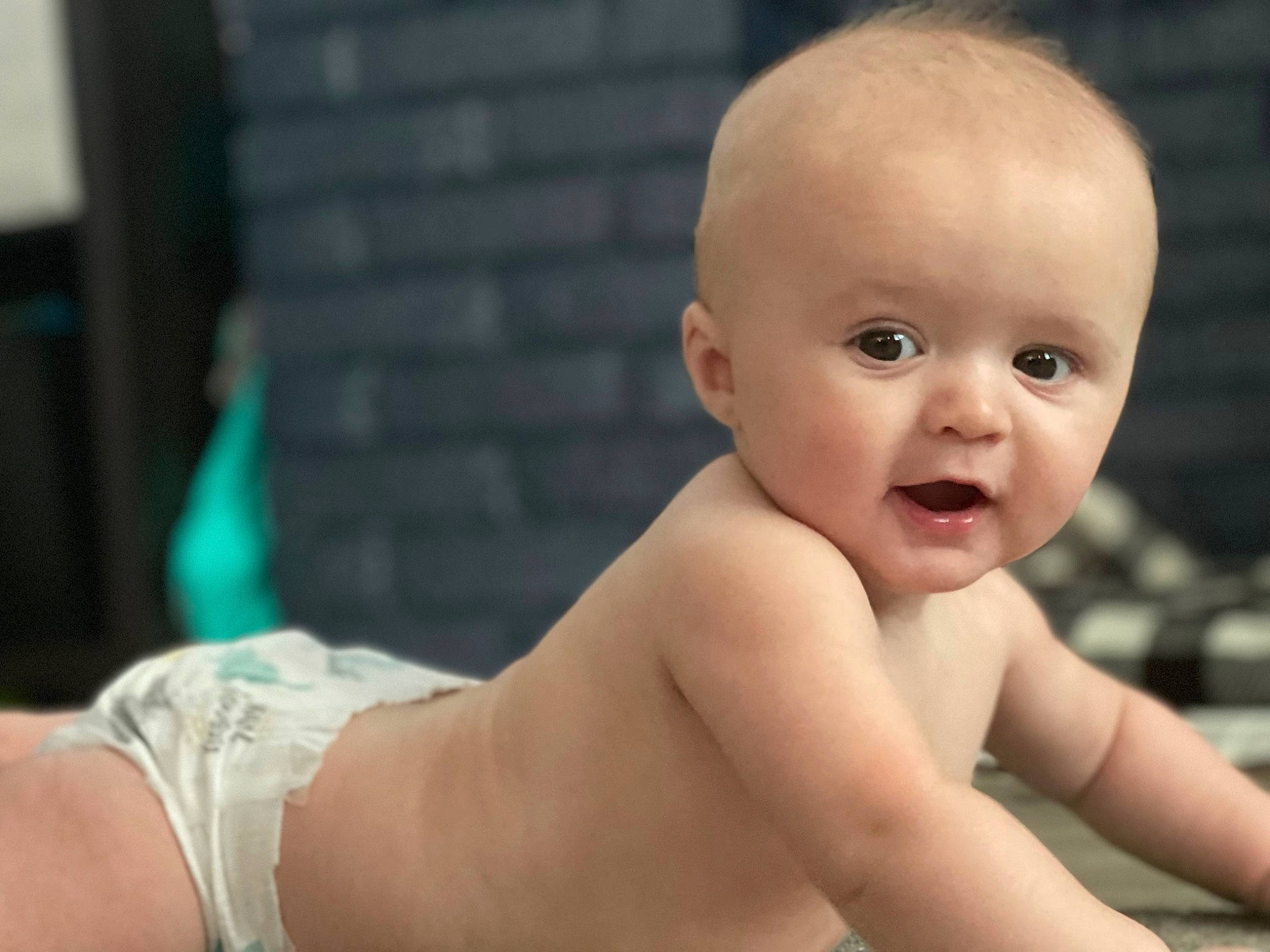 Colson is registered to the contest to win money with this photo: baby, baby_products, baby_toddler_clothing, cheek, chest, child, flooring, foot, fun, happy, human_body, human_leg, leisure, nail, person, sitting, smile, thigh, thumb, toddler
