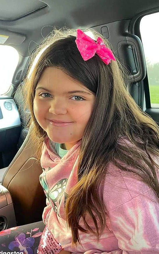 Ellie joined the competition — help win amazing prizes! automotive_design, bangs, black_hair, brown_hair, chin, cool, eyebrow, eyelash, eyewear, fun, hairstyle, happy, joy, layered_hair, lip, long_hair, motor_vehicle, mouth, person, pink