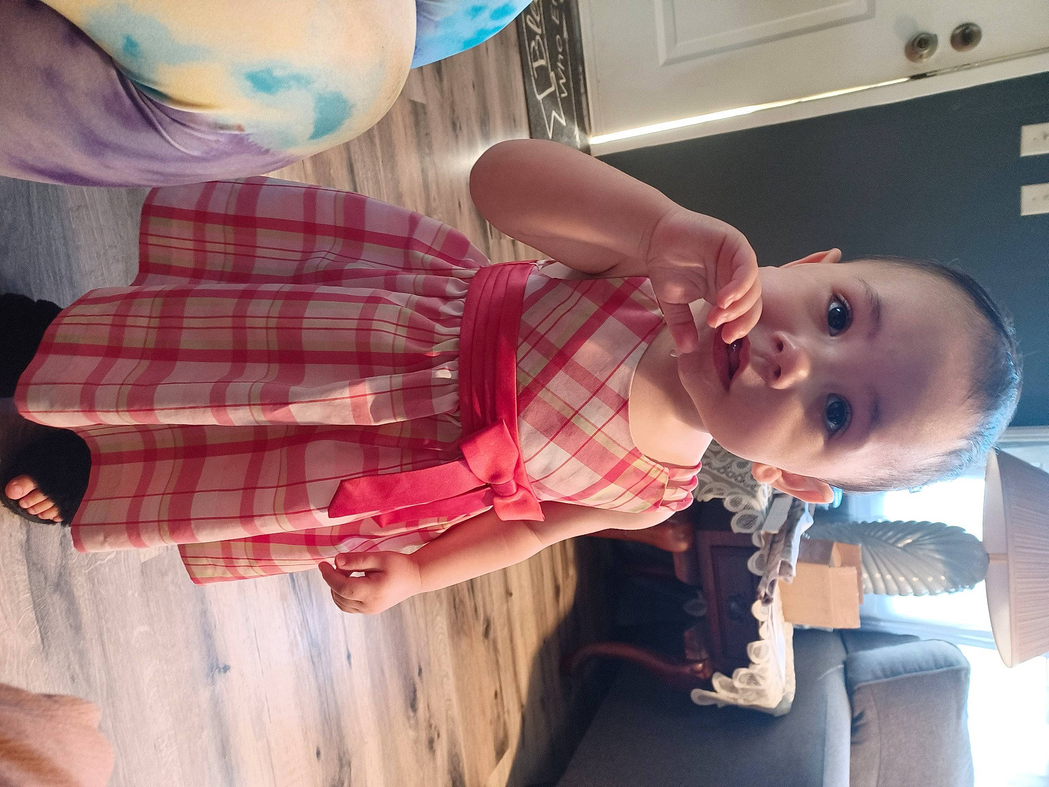 Phoenix joined the competition — help win amazing prizes! baby, baby_toddler_clothing, balloon, child, elbow, facial_expression, finger, fun, happy, mouth, nose, pattern, person, plaid, room, sitting, skin, smile, tartan, toddler