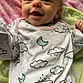 Olivia joined the competition — help win amazing prizes! baby, infant, smiling, onesie, clouds, moon, rainbow, blanket, pink, green, cute, happy, face, head, person, sleepwear, newborn, lying_down, closeup, indoors