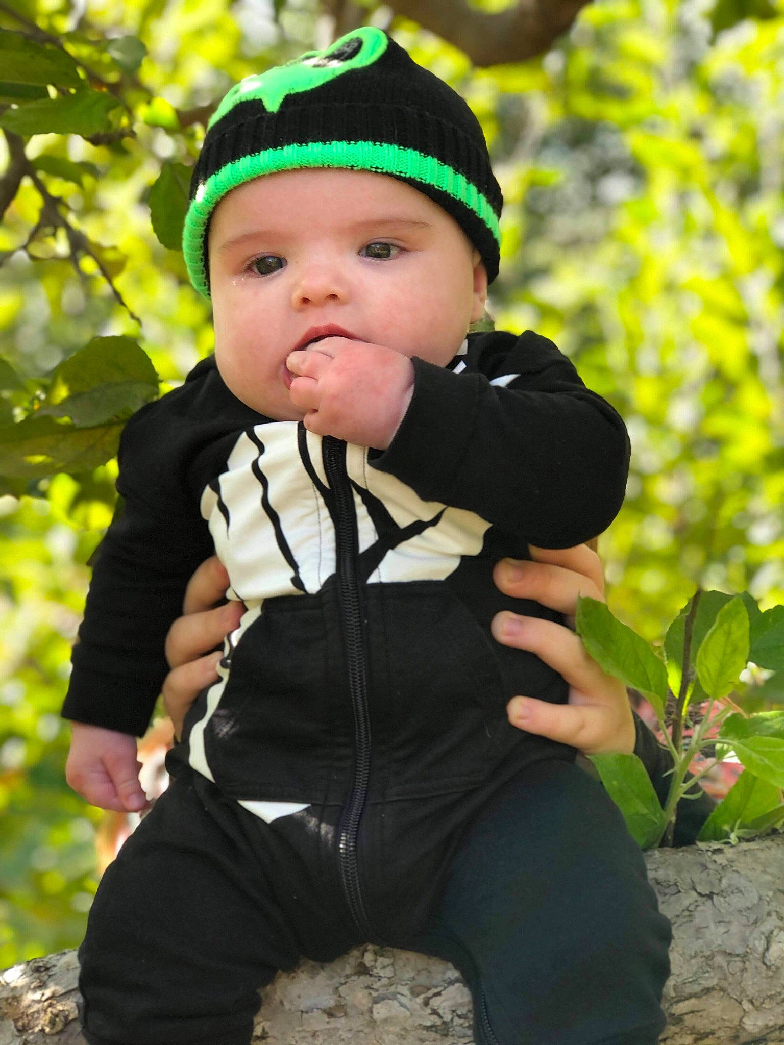 Jacob joined the competition — help win amazing prizes! baby, baby_toddler_clothing, eye, face, flash_photography, forest, formal_wear, grass, happy, hat, head, headwear, human_body, pattern, people_in_nature, person, personal_protective_equipment, plant, sitting, sleeve