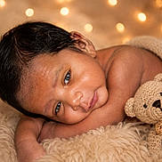 Asher joined the competition — help win amazing prizes! baby, infant, teddy_bear, blanket, soft_texture, cozy, portrait, closeup, warm_lighting, fairy_lights, cute, sleepy, resting, knitted_toy, child, indoor, comfort, peaceful, fuzzy, newborn