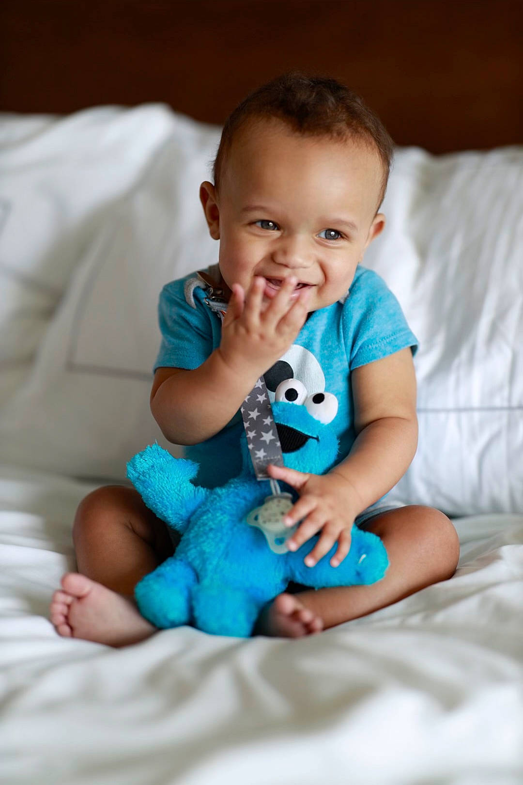 Jakai is registered to the contest to win money with this photo: arm, baby, baby_toddler_clothing, cheek, child, comfort, electric_blue, eye, face, facial_expression, flash_photography, fun, happy, iris, joy, person, sitting, skin, sleeve, smile