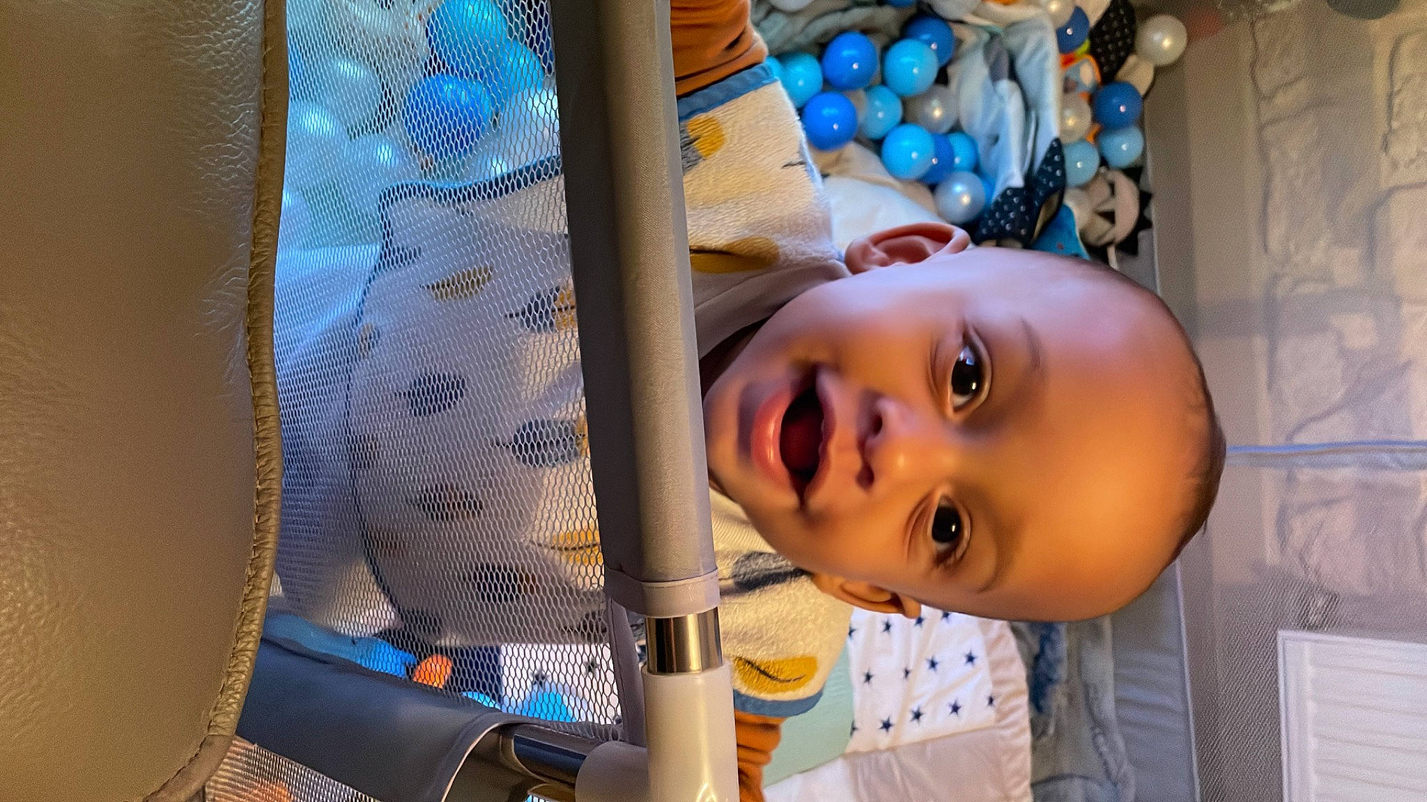 Cameron participe au concours pour gagner de l'argent avec cette photo : baby, baby_products, baby_safety, baby_toddler_clothing, blue, cheek, child, fun, happy, house, iris, leisure, mouth, nose, person, room, skin, smile, toddler, toy