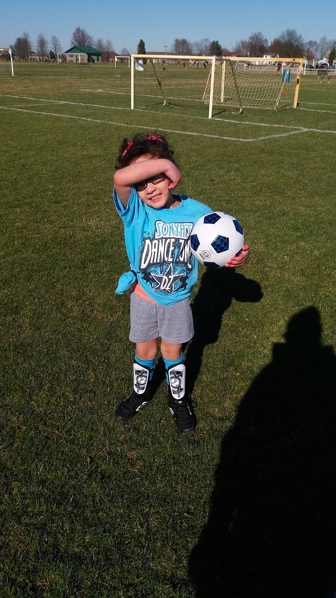 Emmaleigh joined the competition — help win amazing prizes! ball, child, competition_event, football, football_player, grass, headwear, joy, person, play, player, soccer, soccer_ball, sports_equipment, team, team_sport