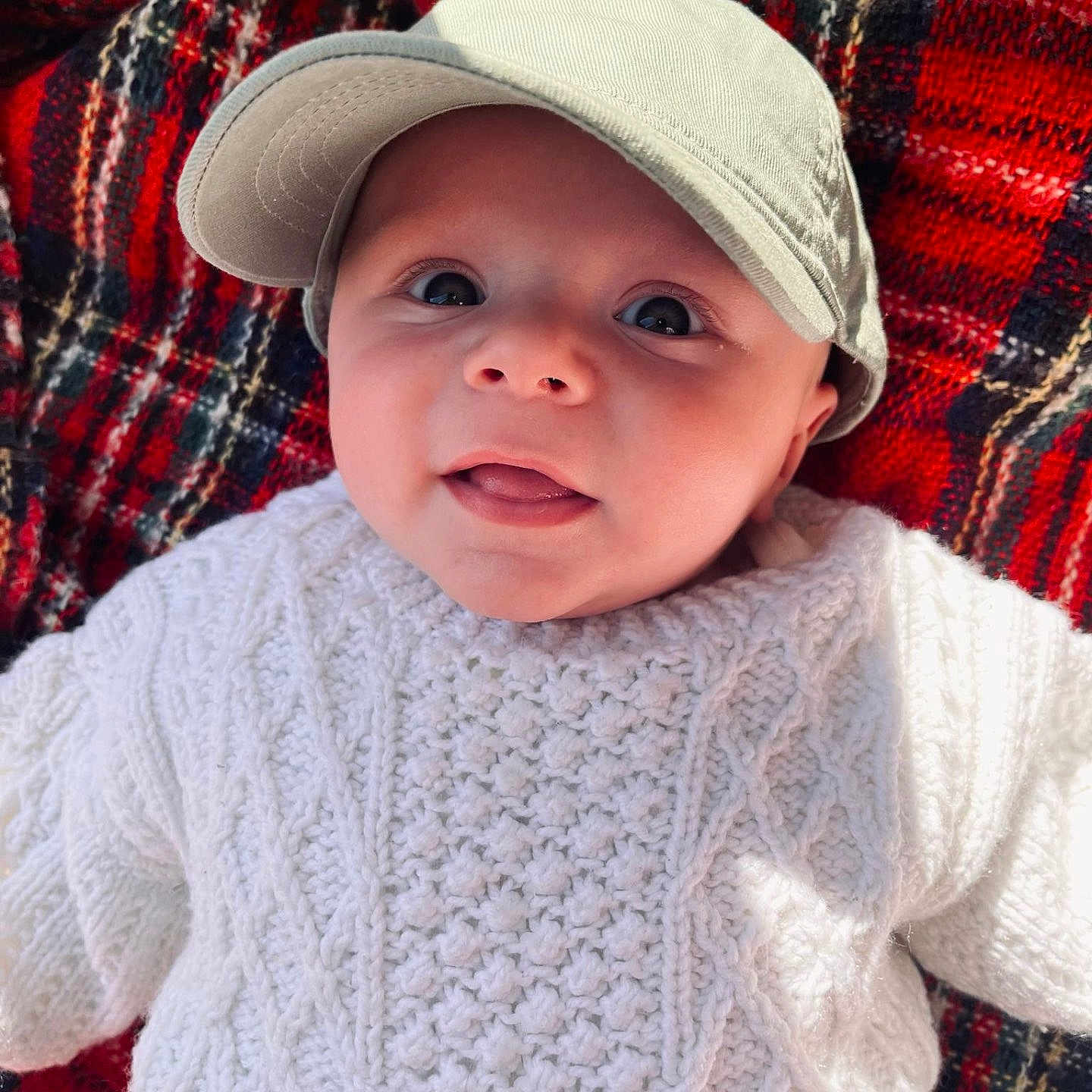 Carter Caleb joined the competition — help win amazing prizes! baby, baseballcap, blanket, bonnet, cap, clothing, coat, couch, face, furniture, hat, head, homedecor, jacket, knitwear, person, photography, portrait, sweater, t_shirt