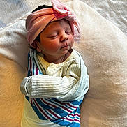 Izzabelle joined the competition — help win amazing prizes! newborn, baby, sleeping, blanket, headband, pink, cozy, wrapped, infant, soft, plush, resting, cute, child, portrait, indoor, peaceful, clothing, swaddled, person