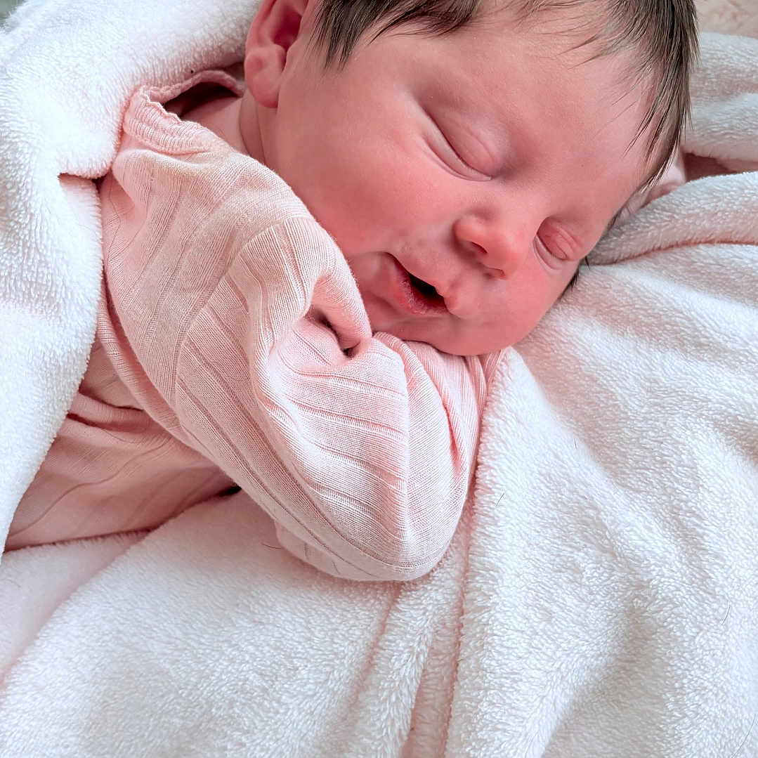 Izzabelle joined the competition — help win amazing prizes! baby, baby_girl, child, close_up, cozy, cute, hair, head, indoors, infant, newborn, peaceful, pink_blanket, pink_clothing, portrait, resting, skin, sleeping, soft_texture, warm