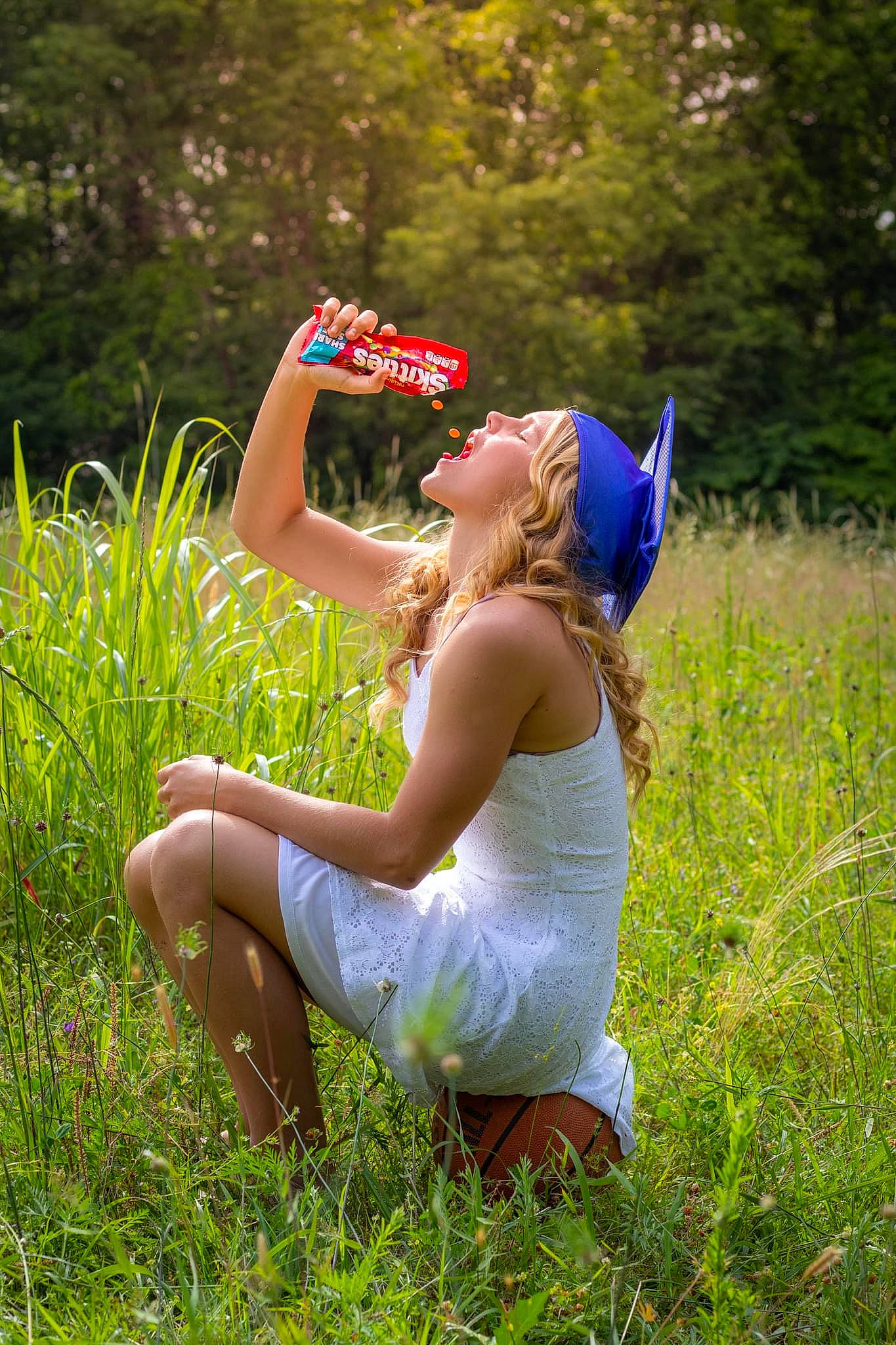 Caylee is registered to the contest to win money with this photo: eyewear, flash_photography, forest, fun, grass, grassland, hand, happy, human_leg, knee, landscape, lawn, leisure, meadow, people_in_nature, person, plant, recreation, sportswear, thigh