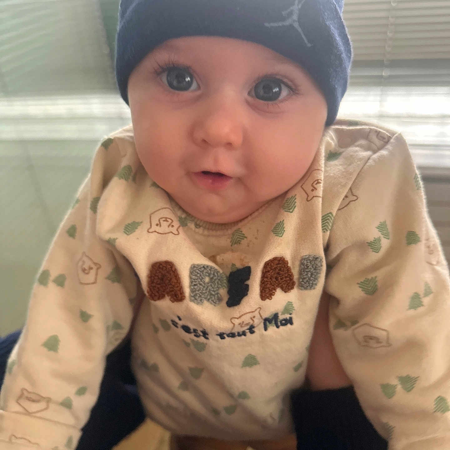 Covaci Sofia participe au concours pour gagner de l'argent avec cette photo : baby, beanie, child, closeup, clothing, curtains, cute, expression, eyes, face, hands, hat, indoor, infant, person, portrait, soft_light, sweater, window, young