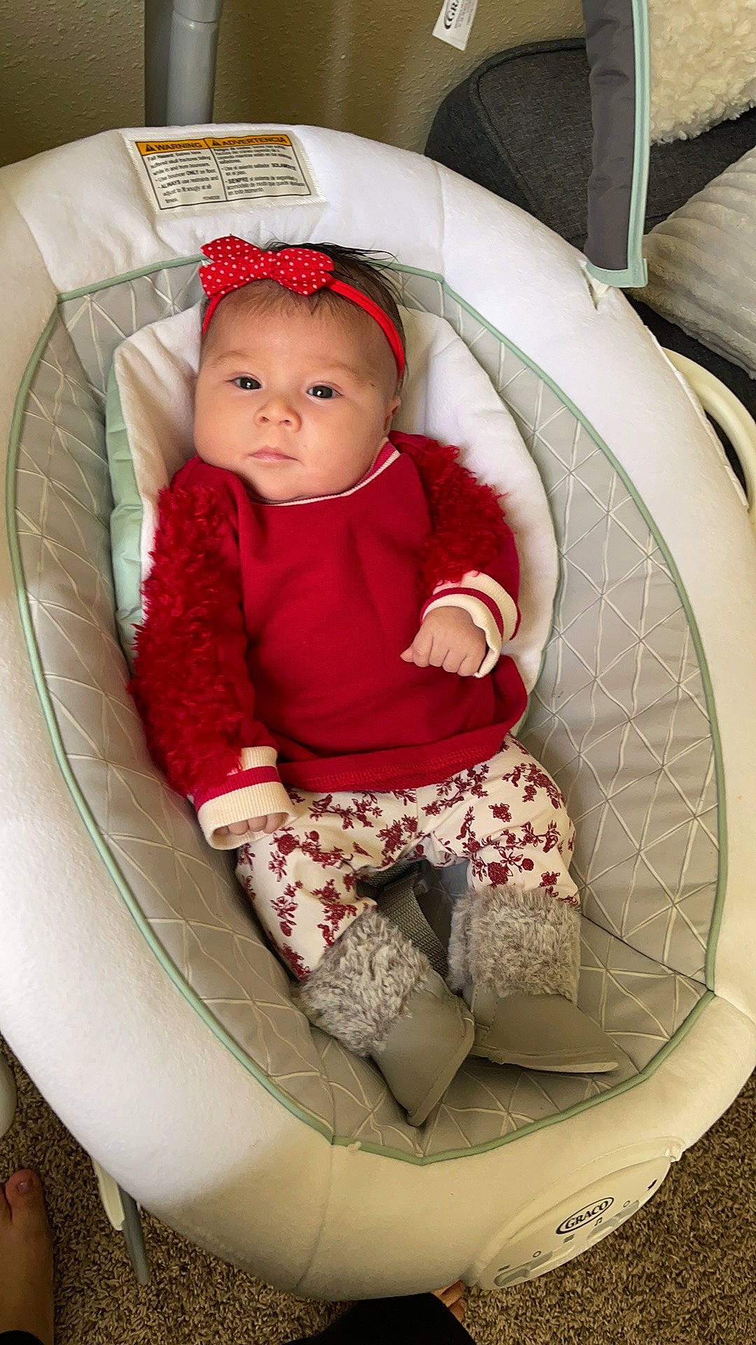 Yadelin is registered to the contest to win money with this photo: baby, baby_carriage, baby_products, baby_toddler_clothing, car_seat, carmine, chair, child, circle, comfort, fun, hat, headwear, lap, pattern, person, recreation, sitting, sleeve, sock