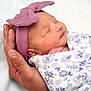 newborn, baby, infant, sleeping, hand, blanket, headband, purple, floral, wrapped, peaceful, closeup, skin, portrait, cute, soft, resting, child, tender, warmth