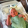 newborn, baby, infant, hospital, bassinet, blanket, headband, bow, clothing, mint_green, wrapped, cute, sleepy, person, skin, hand, portrait, indoors, baby_wear, hospital_band
