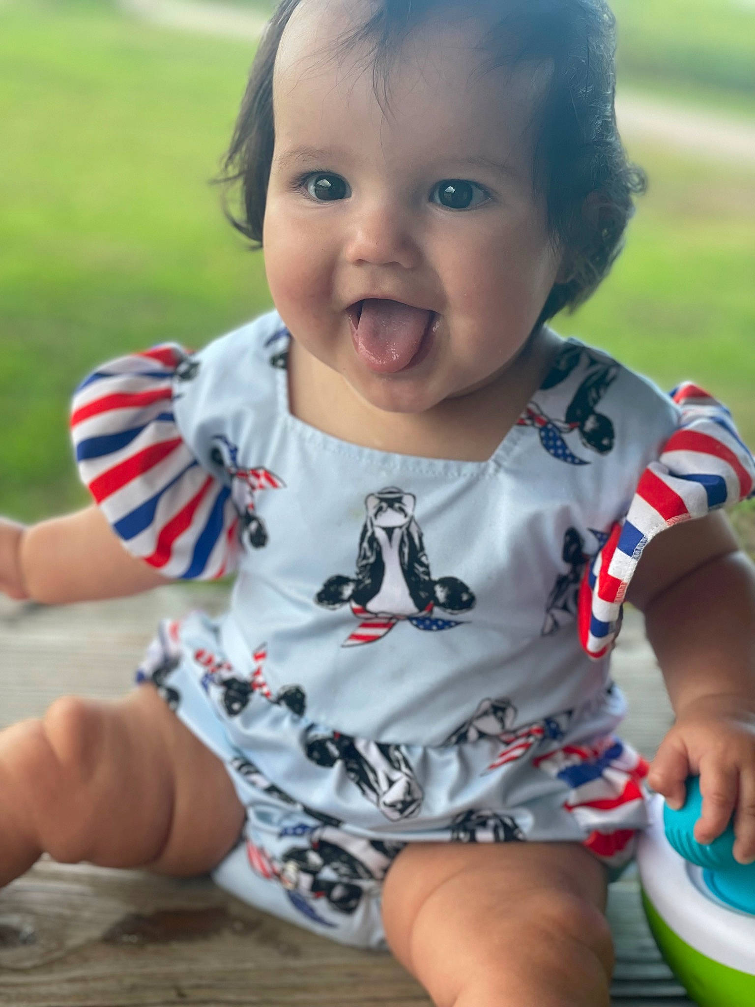 Luciana joined the competition — help win amazing prizes! baby_toddler_clothing, cheek, dress, facial_expression, finger, grass, green, hairstyle, happy, head, leaf, nose, person, photograph, pink, product, skin, sleeve, smile, standing