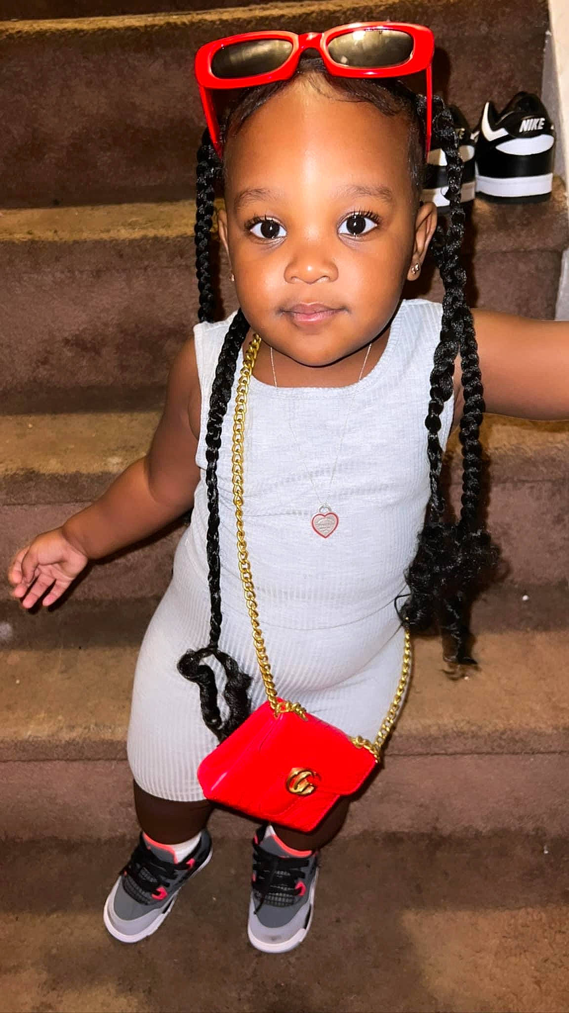 Sandior joined the competition — help win amazing prizes! baby_toddler_clothing, black_hair, cool, eye, face, facial_expression, fashion, fun, hairstyle, happy, head, headgear, jewellery, organ, person, red, skin, sleeve, standing, toddler