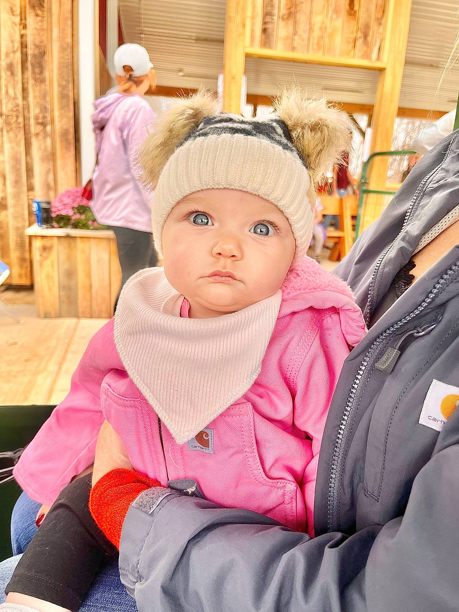 Novalee is registered to the contest to win money with this photo: baby, beanie, cap, child, comfort, curtain, fashion_accessory, fun, happy, headwear, houseplant, knit_cap, leisure, magenta, outerwear, person, sitting, toddler, travel, vacation