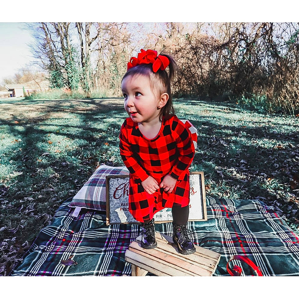 Talia Rose is registered to the contest to win money with this photo: baby, baby_toddler_clothing, cool, fun, grass, happy, leisure, pattern, people_in_nature, person, photograph, plaid, plant, recreation, sky, sleeve, snapshot, street_fashion, tartan, toddler