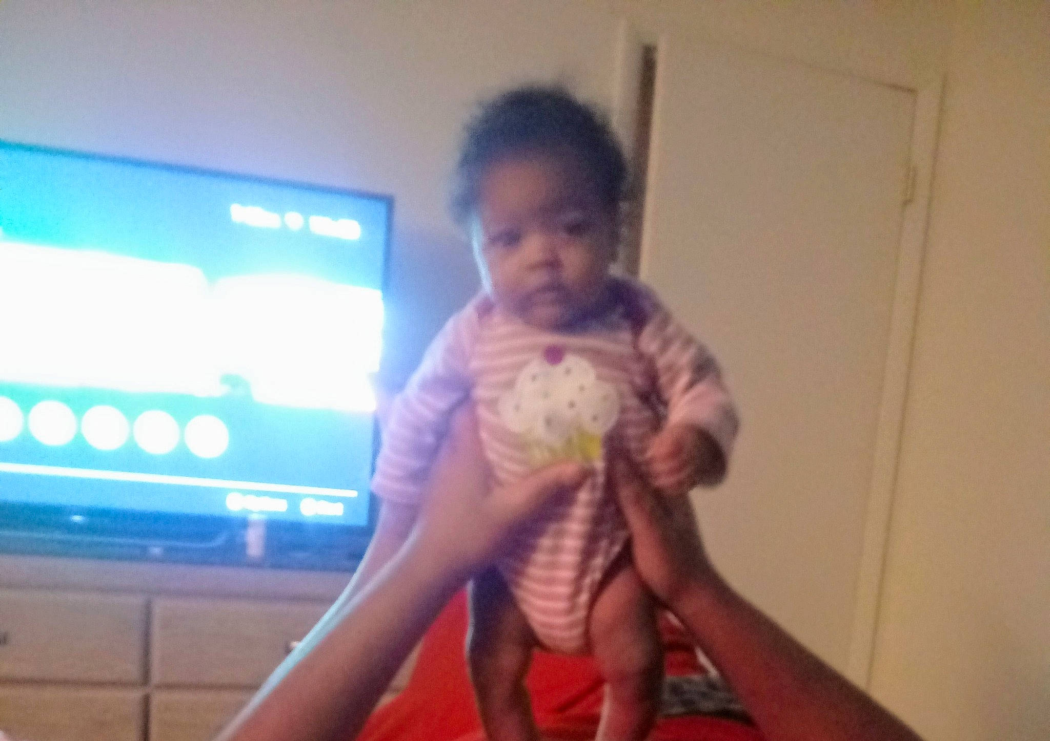 Monica is registered to the contest to win money with this photo: child, day, eye, face, finger, fun, girl, hair, hairstyle, hand, head, human_hair_color, joint, leg, person, shoulder, sitting, skin, snapshot, thigh