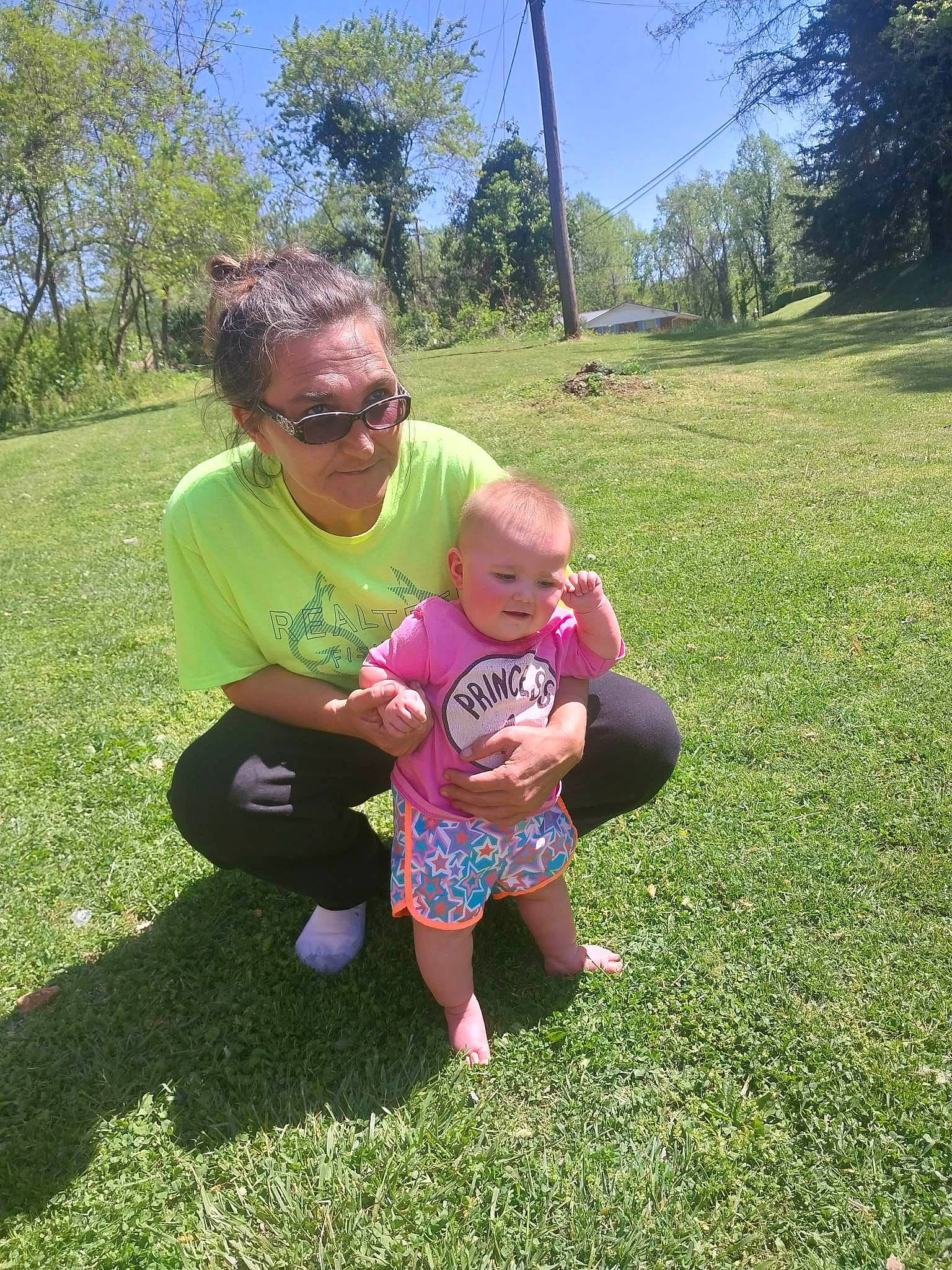 Olivia joined the competition — help win amazing prizes! baby_toddler_clothing, botany, fun, grass, grass_family, grassland, groundcover, happy, lawn, leaf, leisure, meadow, people_in_nature, person, plant, recreation, sky, sunglasses, t_shirt, toddler
