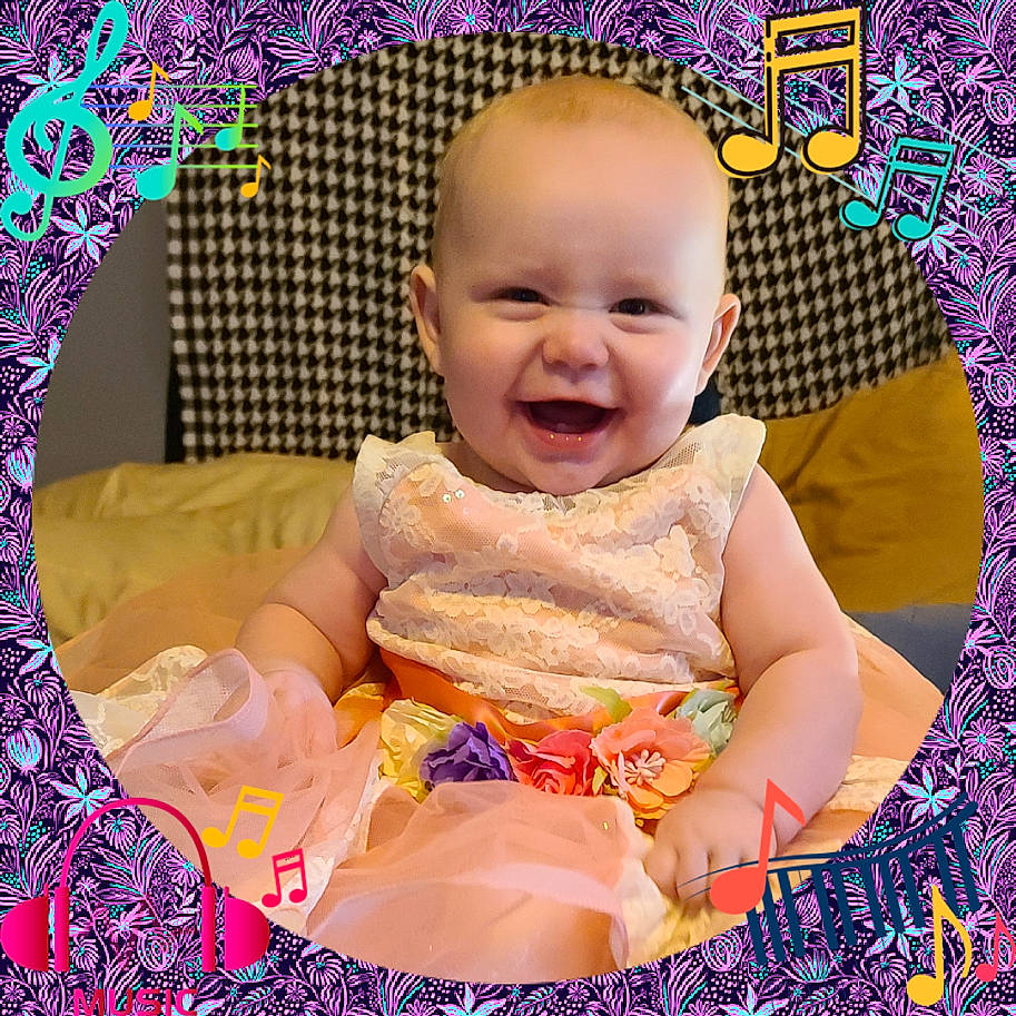 Catalinia is registered to the contest to win money with this photo: baby, baby_laughing, baby_toddler_clothing, beauty, child, design, facial_expression, fun, happy, joy, magenta, pattern, person, pink, play, product, purple, sitting, sleeve, smile