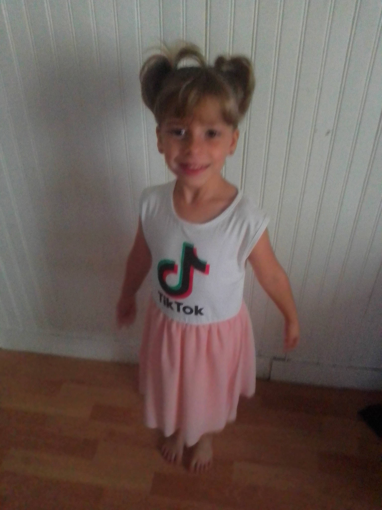 Timélya participe au concours pour gagner de l'argent avec cette photo : baby_toddler_clothing, ballet_tutu, child, clothing, costume, dance, dress, joy, person, pink, product, shoe, sleeve, smile, sportswear, standing, t_shirt, toddler