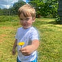 Jaxson joined the competition — help win amazing prizes! boy, casual_clothing, child, cute, dandelion, daylight, flower, grass, greenery, nature, outdoor, playful, portrait, shorts, smile, summer, sunny, tree, tshirt, yard