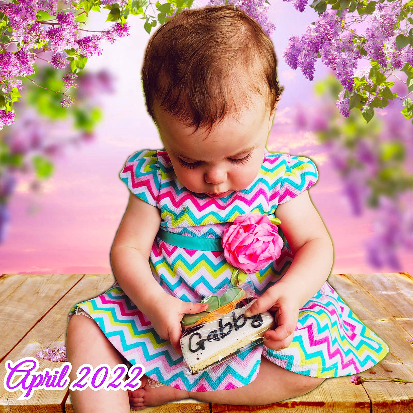 Gabriella joined the competition — help win amazing prizes! baby_toddler_clothing, child, facial_expression, flower, fun, grass, hairstyle, happy, magenta, pattern, people_in_nature, person, petal, pink, plant, purple, sitting, skin, summer, t_shirt