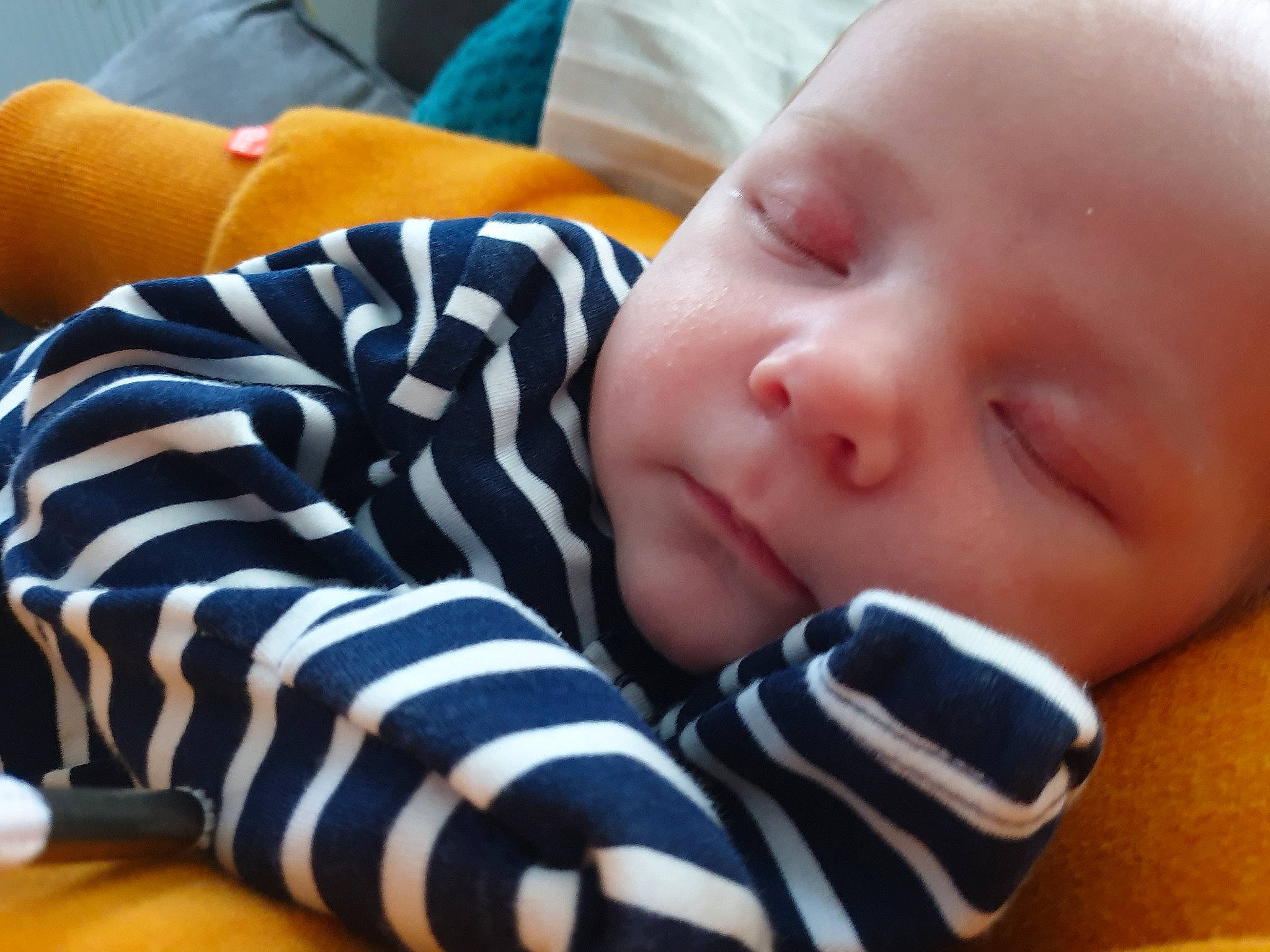 Jenson is registered to the contest to win money with this photo: baby, baby_sleeping, bedtime, cheek, child, face, finger, hand, head, lip, mouth, nap, nose, person, skin, sleep, toddler