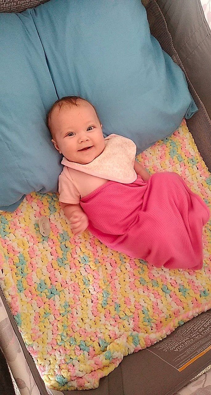 Catherine joined the competition — help win amazing prizes! baby, bedding, blanket, child, comfort, furniture, linens, nap_mat, person, pink, product, skin, smile, textile, toddler