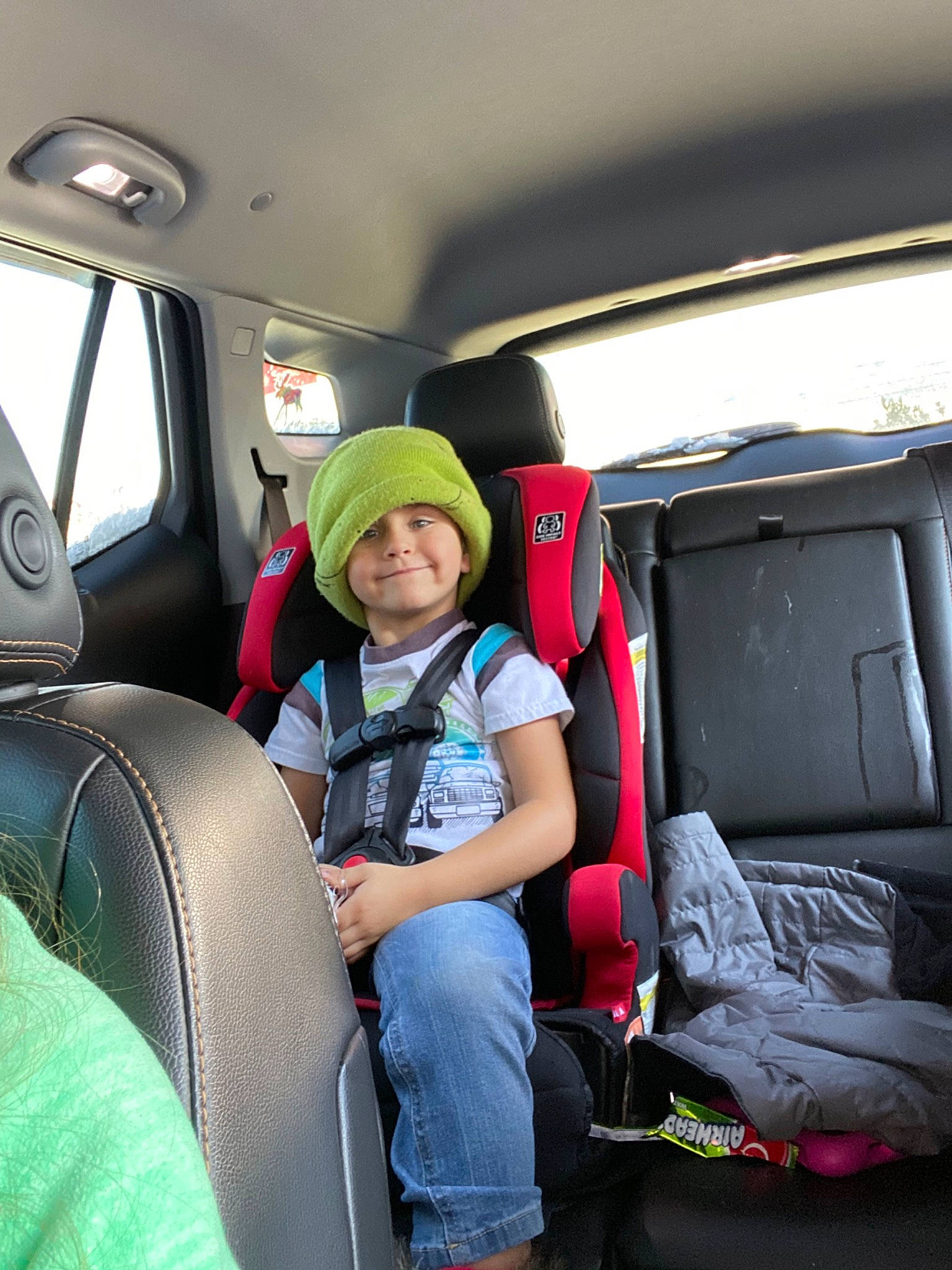 Kreedon is registered to the contest to win money with this photo: auto_part, car, car_seat, family_car, head_restraint, joy, passenger, person, vehicle