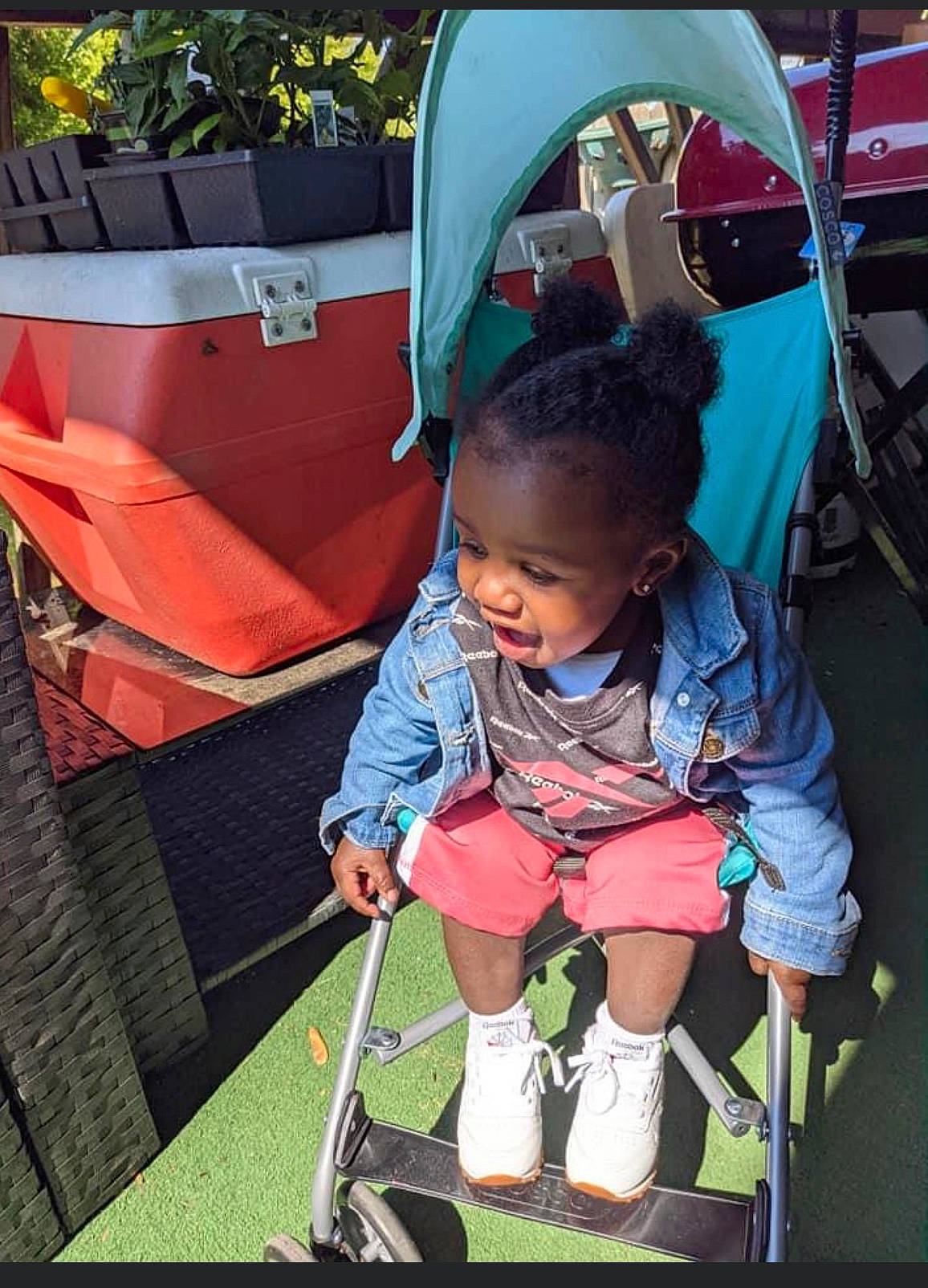 Asia joined the competition — help win amazing prizes! baby, baby_carriage, baby_products, child, fashion_accessory, fun, grass, leisure, mode_of_transport, person, photograph, play, recreation, sitting, snapshot, tent, tire, toddler, travel, vacation