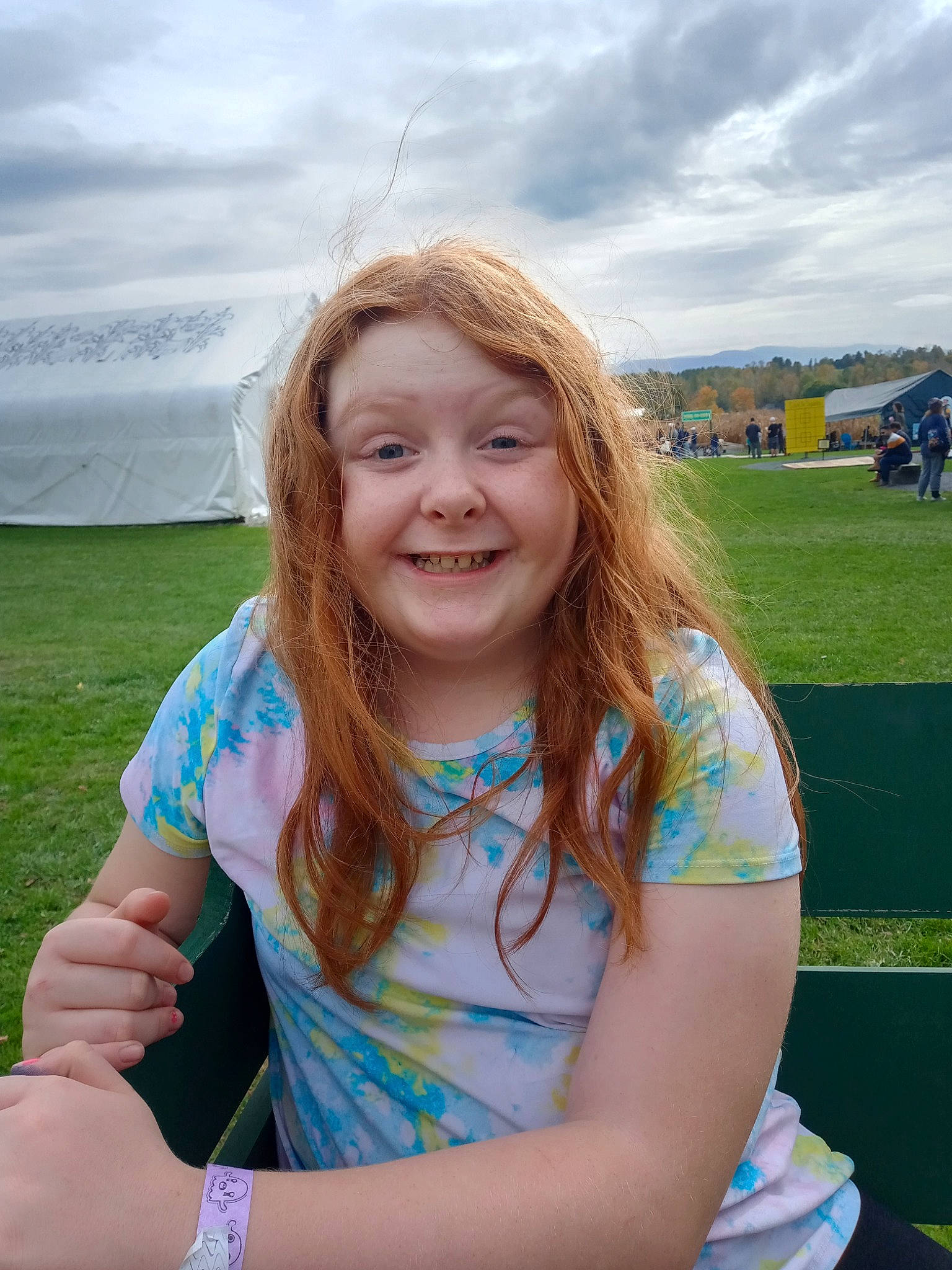 Lillianna joined the competition — help win amazing prizes! blond, cloud, electric_blue, event, facial_expression, fun, grass, grassland, happy, jewellery, joy, leisure, long_hair, people_in_nature, person, plant, recreation, sitting, sky, smile