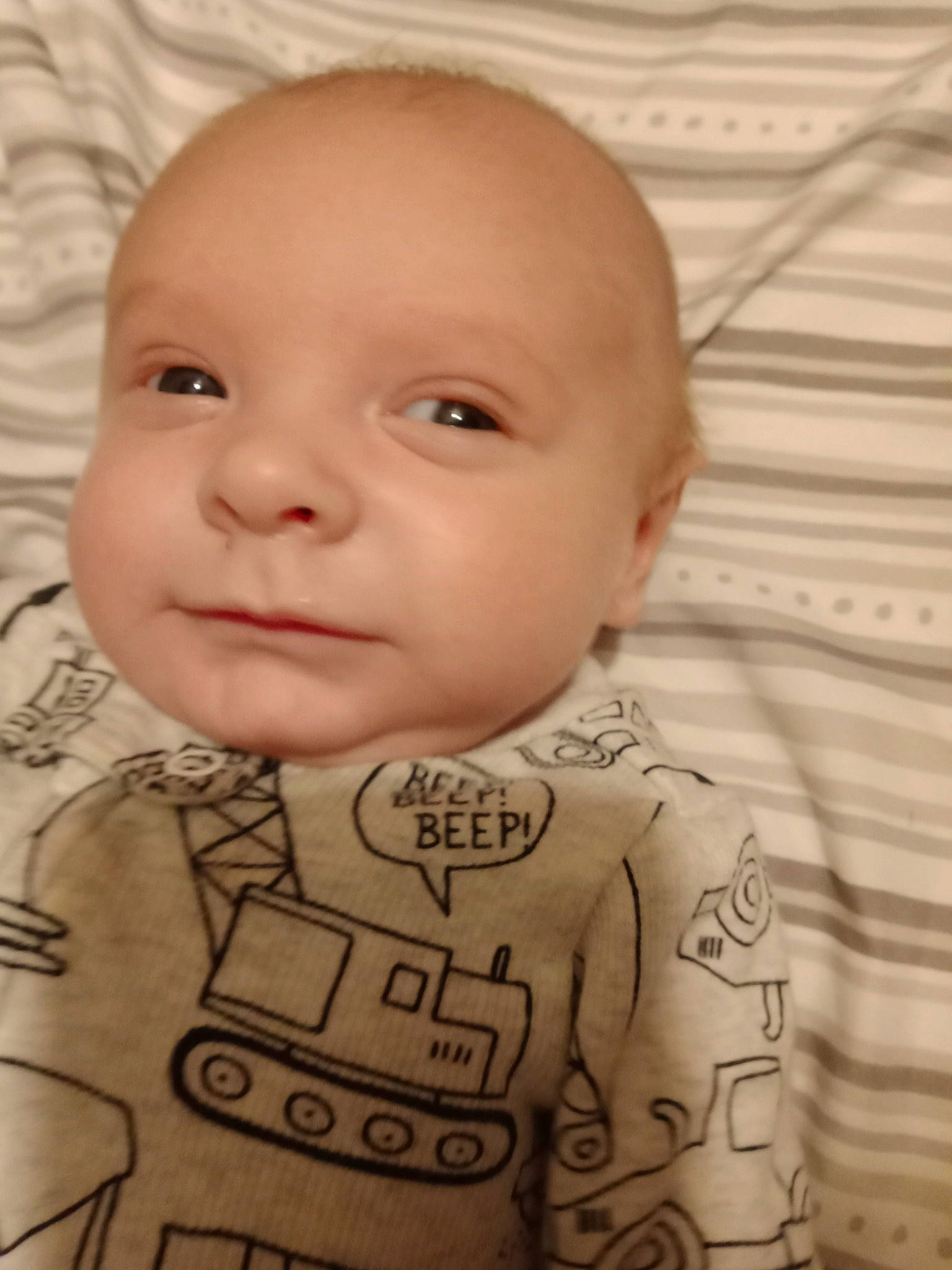 Axel is registered to the contest to win money with this photo: baby, baby_toddler_clothing, cheek, chin, collar, eye, eyebrow, facial_expression, forehead, happy, iris, lip, mammal, mouth, nose, outerwear, person, skin, sleeve, smile
