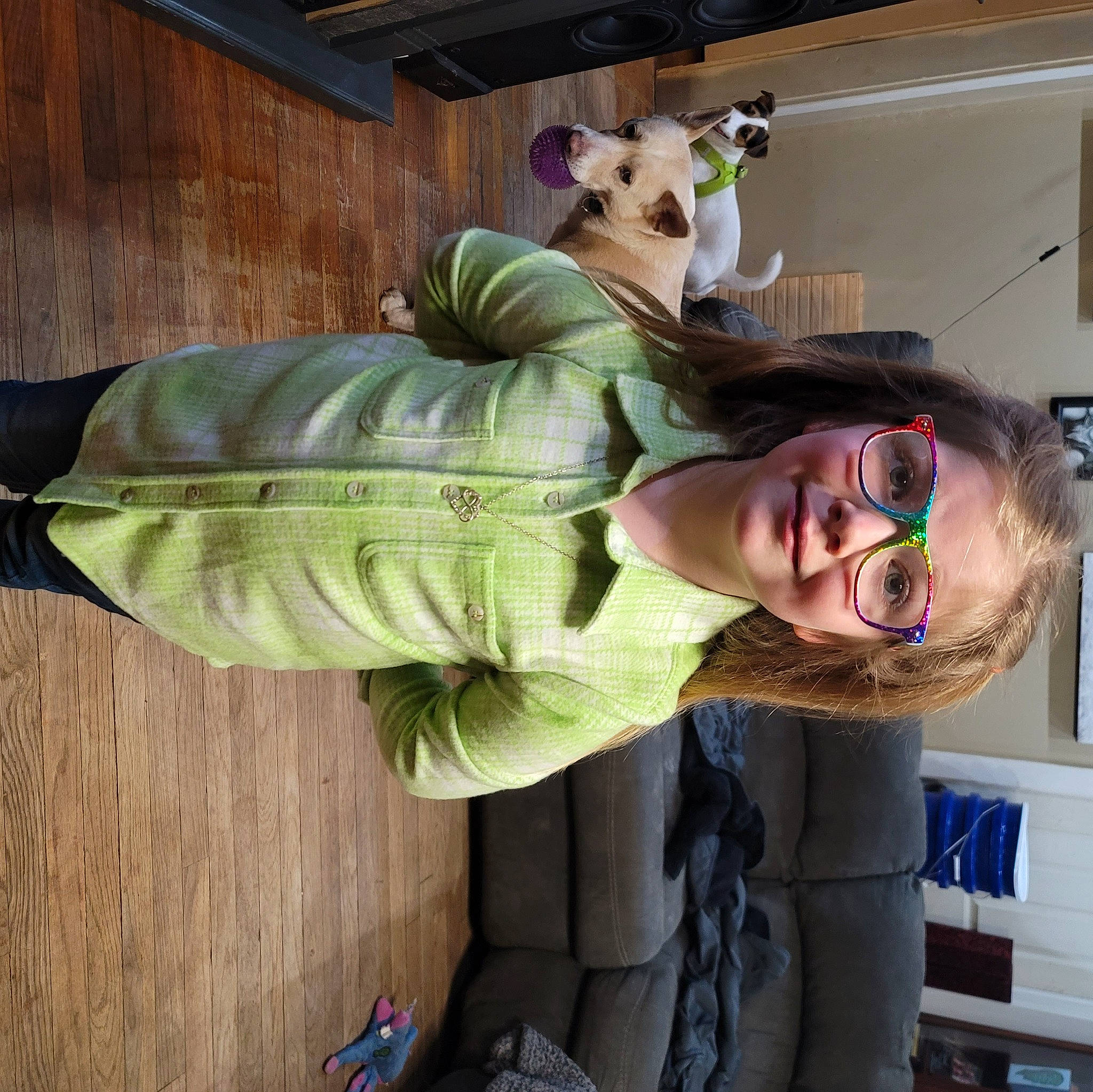 Leanna is registered to the contest to win money with this photo: child, comfort, cool, costume, eyewear, fun, fur, glove, happy, headgear, person, personal_protective_equipment, plush, room, selfie, smile, stuffed_toy, toy, wood