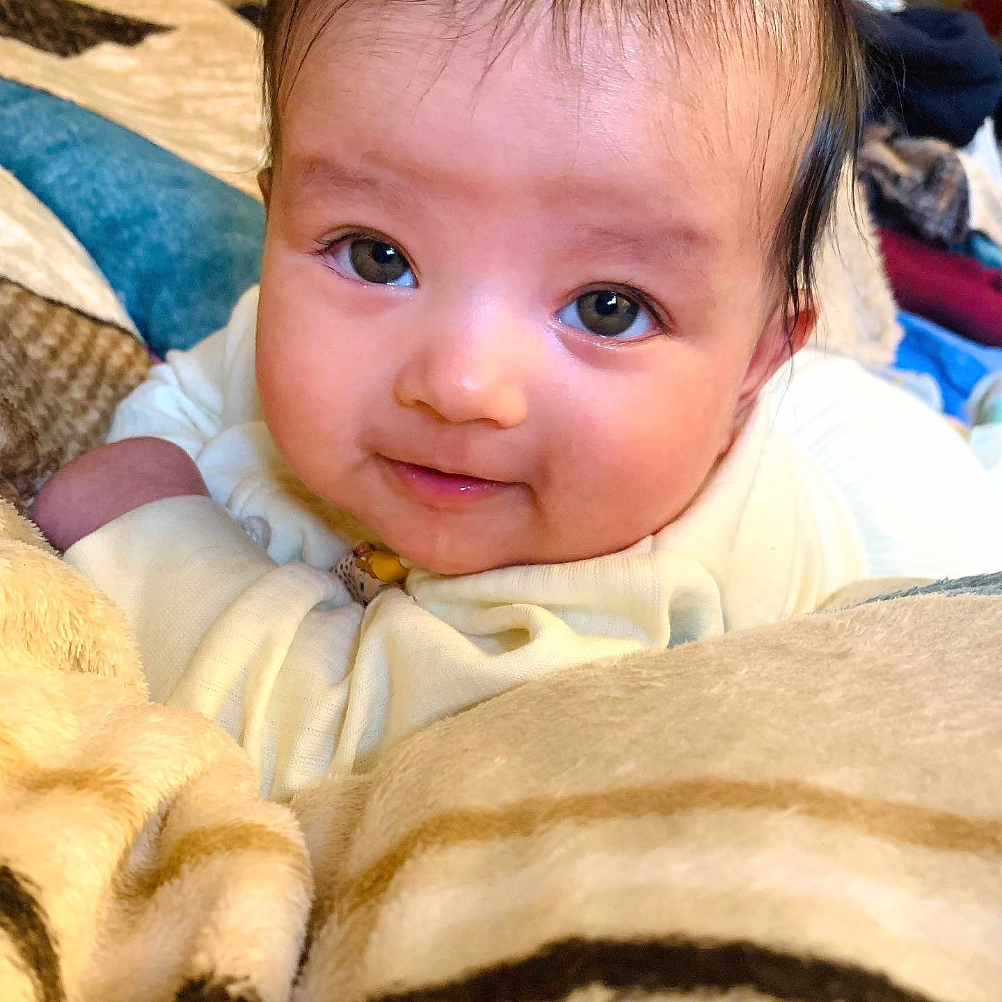 Sara Singh joined the competition — help win amazing prizes! baby, bed, bedroom, blanket, couch, crib, cushion, face, furniture, happy, head, homedecor, infantbed, linen, newborn, person, photography, portrait, quilt, smile