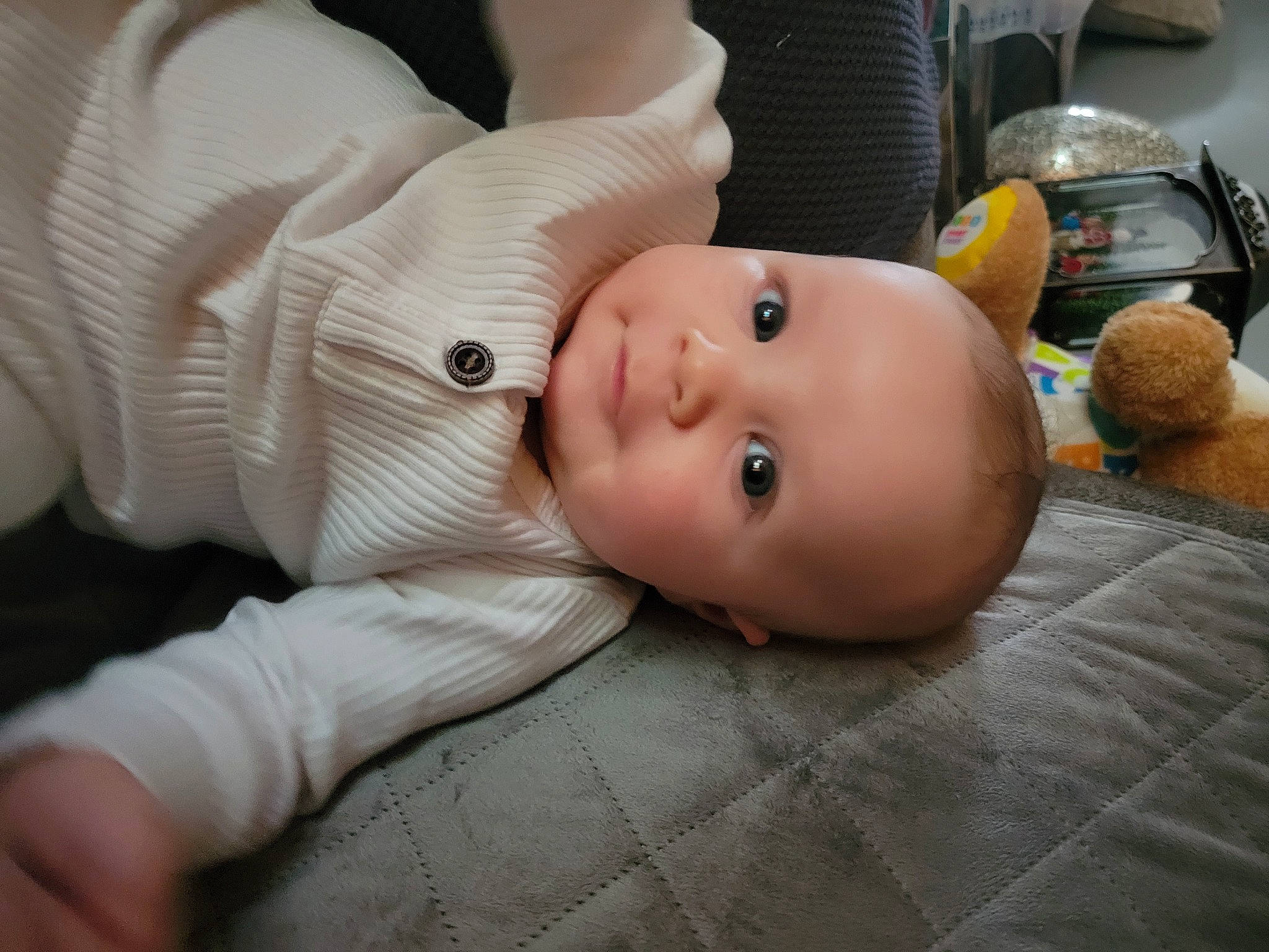 Titus joined the competition — help win amazing prizes! baby, baby_products, baby_toddler_clothing, cheek, child, comfort, eye, eyebrow, flooring, fur, head, human_body, nose, person, room, sitting, smile, stuffed_toy, toddler, toy
