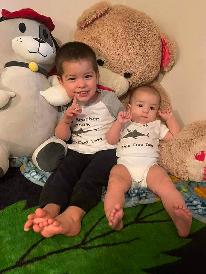 Andres joined the competition — help win amazing prizes! baby, baby_toddler_clothing, child, comfort, event, face, facial_expression, fun, grass, happy, joy, leg, nose, organ, person, skin, smile, t_shirt, toddler, toy