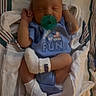 newborn, baby, pacifier, sleeping, hospital, blanket, onesie, blue_clothing, infant, bed, socks, wrapped, cute, small, child, person, resting, indoors, hospital_band, peaceful