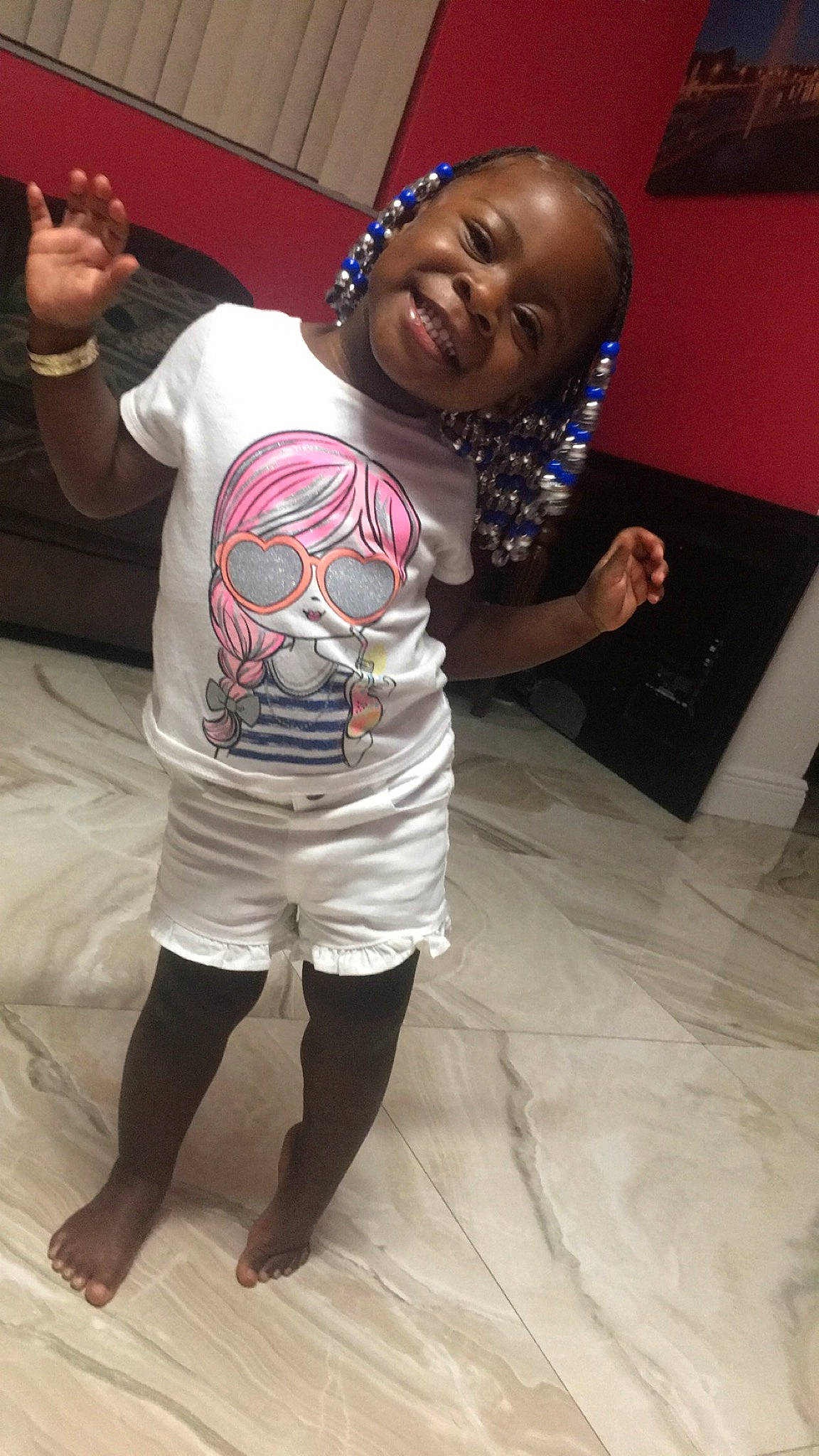 Alaysia is registered to the contest to win money with this photo: child, cool, fun, joint, joy, leg, person, smile, t_shirt, toddler