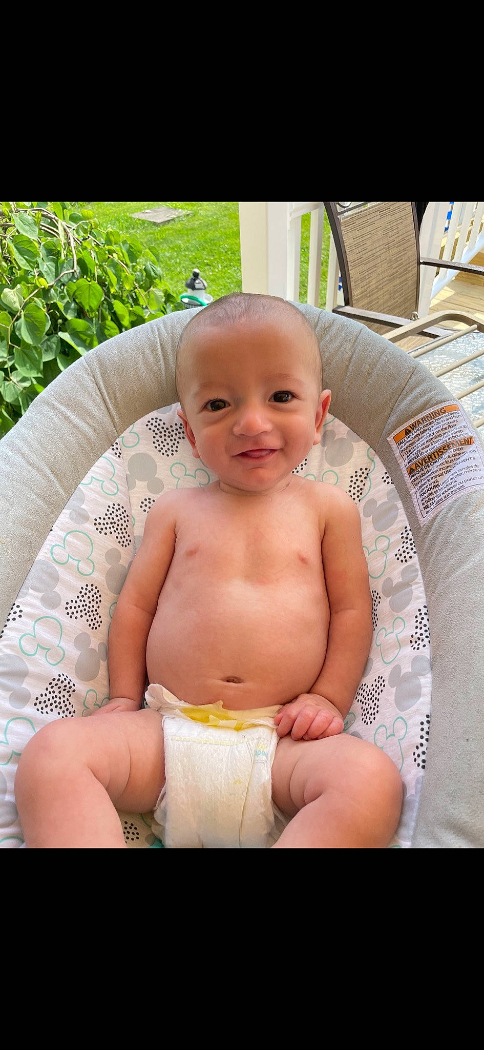Cashton is registered to the contest to win money with this photo: baby, baby_products, bathing, chair, cheek, chest, child, comfort, diaper, happy, human_leg, joy, person, plant, product, sitting, skin, smile, stomach, thigh