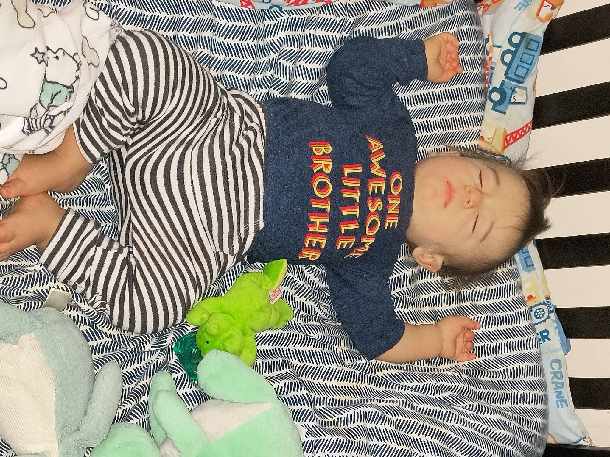 Artemis is registered to the contest to win money with this photo: child, comfort, cool, design, font, fun, hairstyle, happy, hat, human, mammal, pattern, people, person, room, sitting, sleeve, t_shirt, textile, thigh